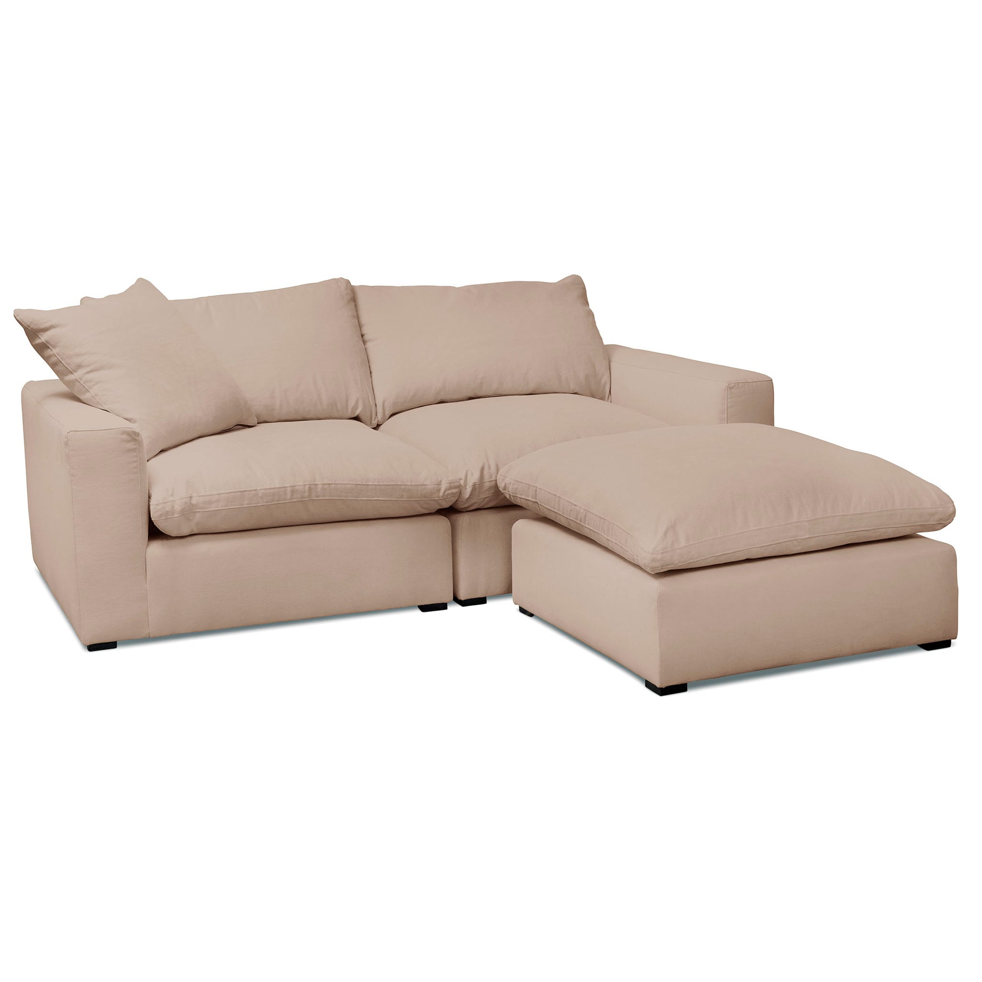 Stor och mjuk beige 3-sits soffa med fotpall